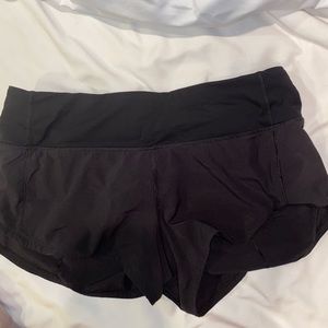 Black speed up lululemon shorts.